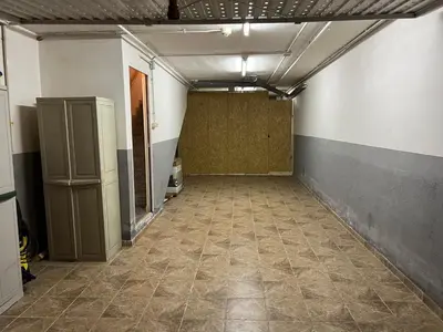 an empty hallway of a room with a tile floor at Cozy Beach House with Pool & BBQ in Cubelles