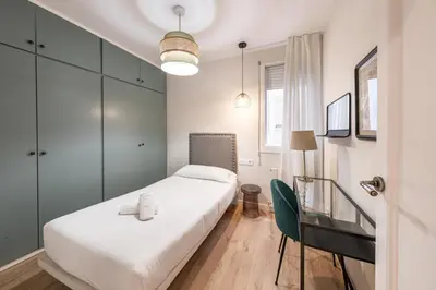 a view of a city street from a window at BeBarceloner Eixample Apartments- 4 bedrooms in Barcelona