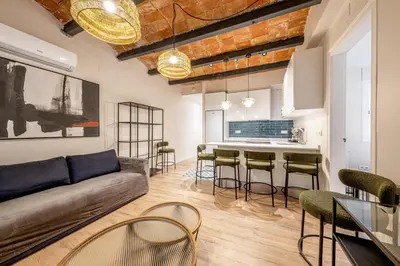 a dressing room with a mirror and a dressing table at BeBarceloner Eixample Apartments - 4 bedrooms in Barcelona